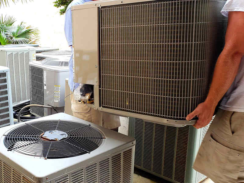 Technician is checking air conditioner
